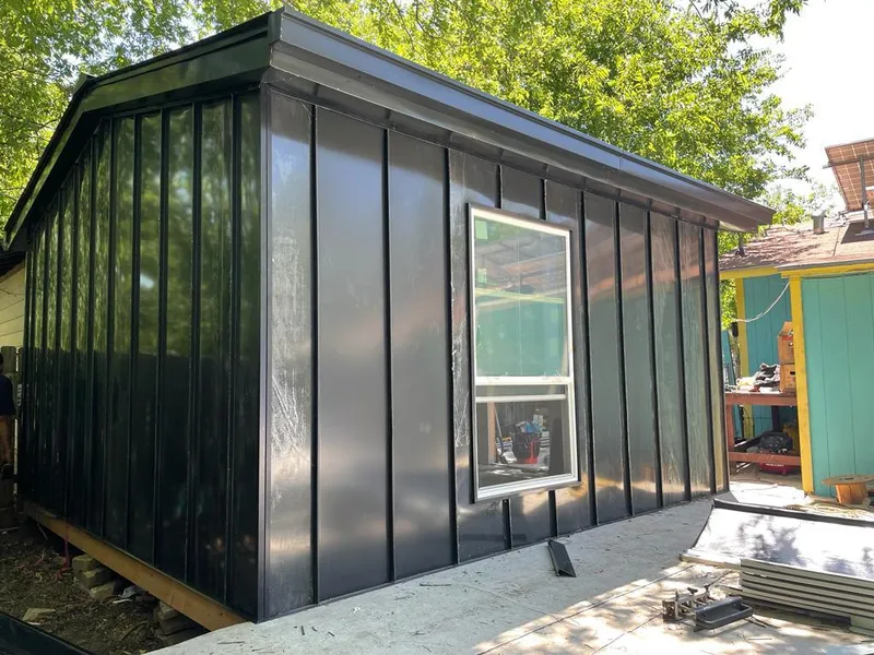 Black standing seam metal wall panels for Roof Inspection in Kathleen