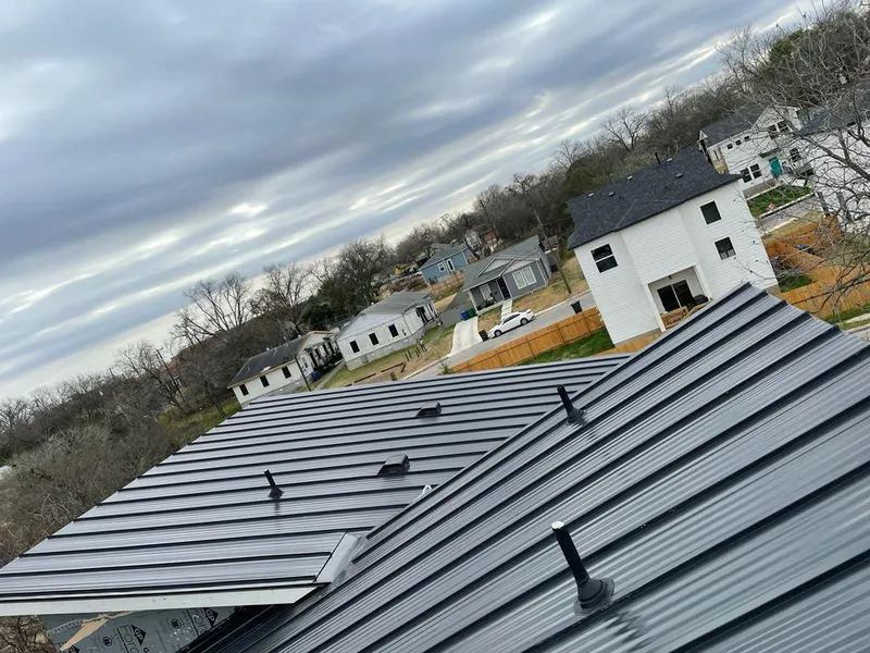 Standing seam metal roof panels with vents for Skylight Repair in Kathleen